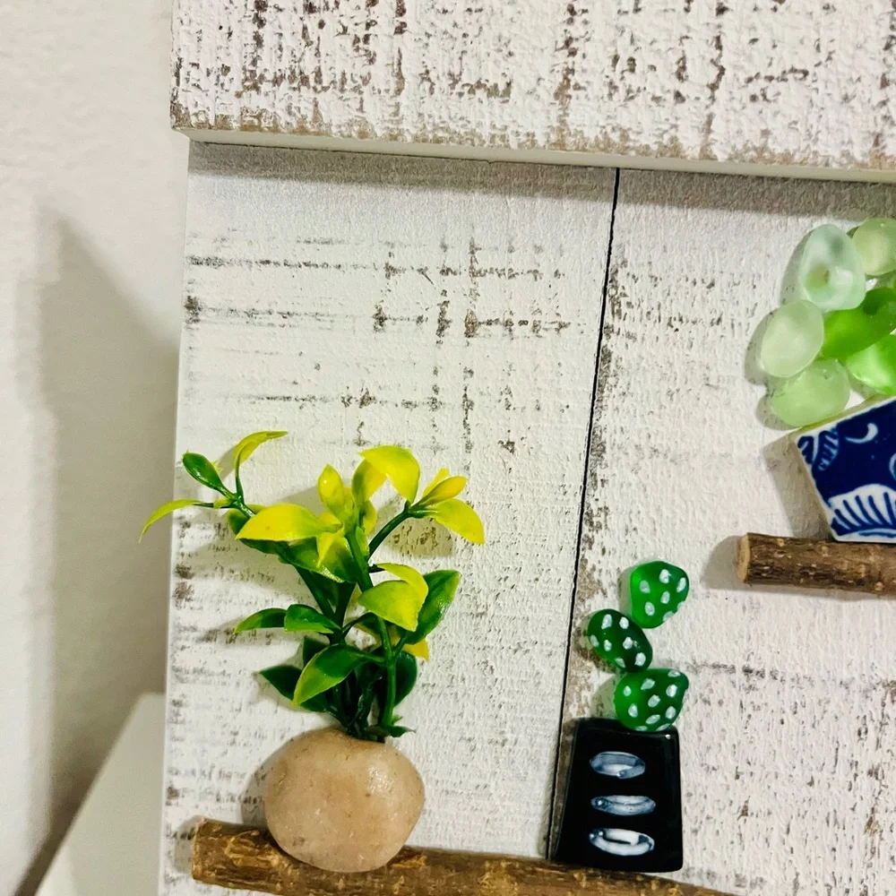 Rustic White Wall Decor with Gold Cat and Green Plants